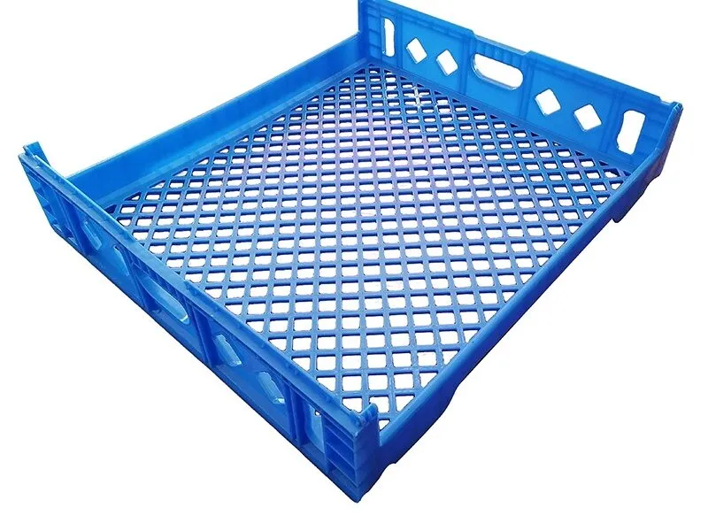 Blue plastic bread crate tray, ventilated, for baking use.