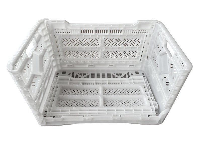White plastic milk crate, stackable design with ventilated structure, ideal for storage and transport.