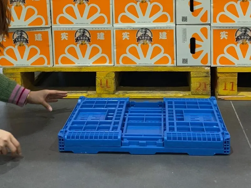 A blue reusable delivery tote, shown in a folded state.