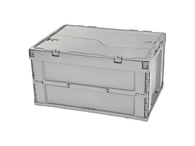 A gray stackable plastic crate with a lid, designed for parts distribution, showcasing its compact, foldable structure.