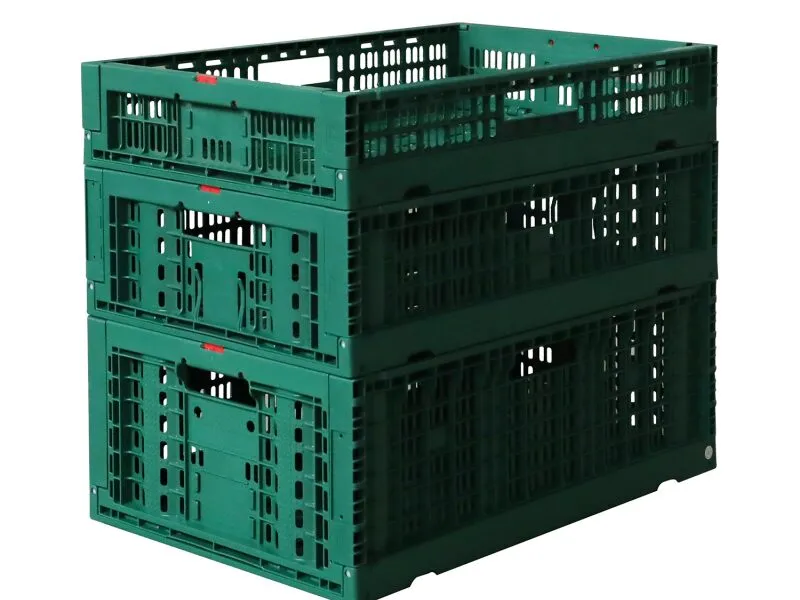 Stackable and lockable green plastic crates, designed for secure and efficient stacking.